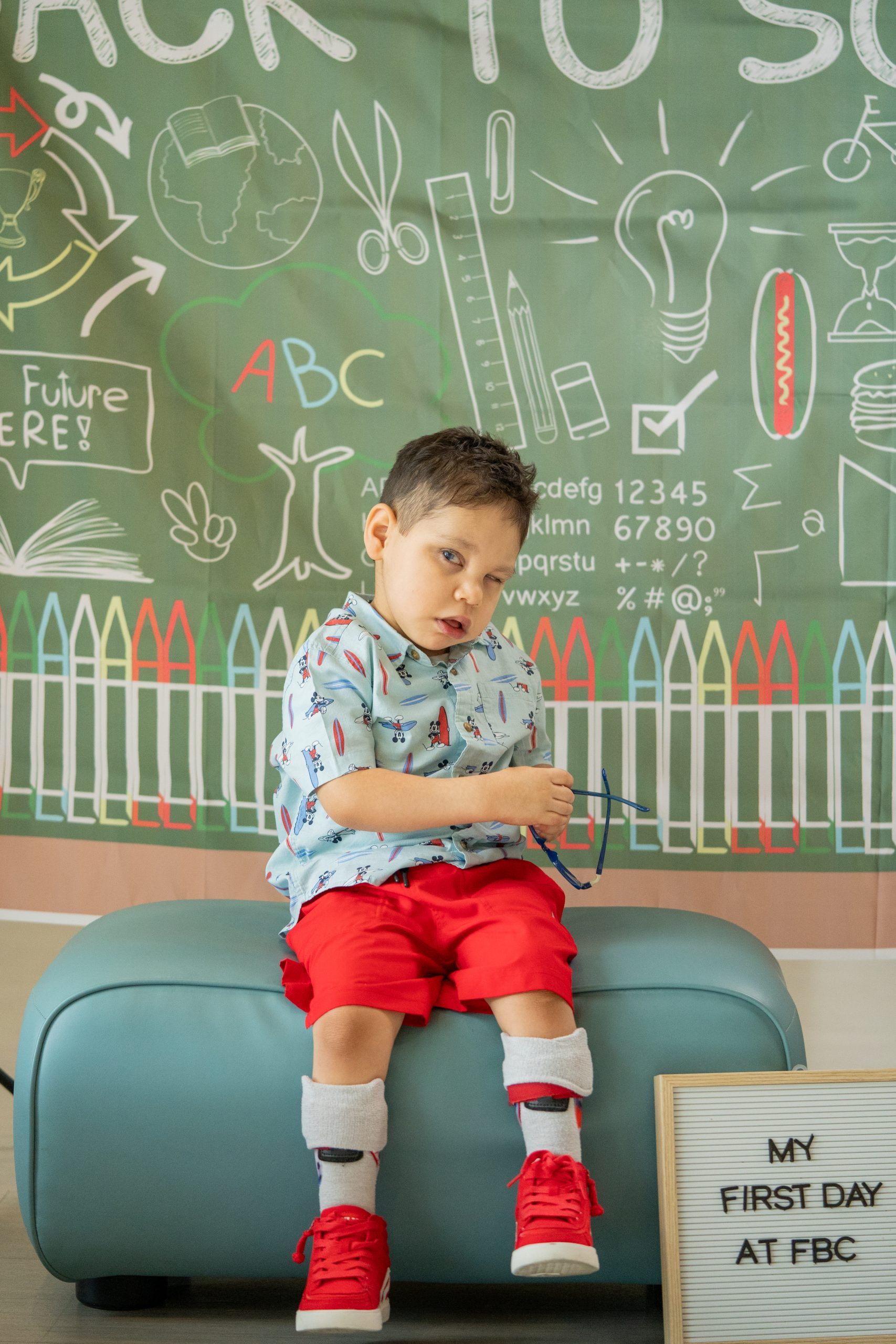A young boy posing for the camera at FBCs main campus