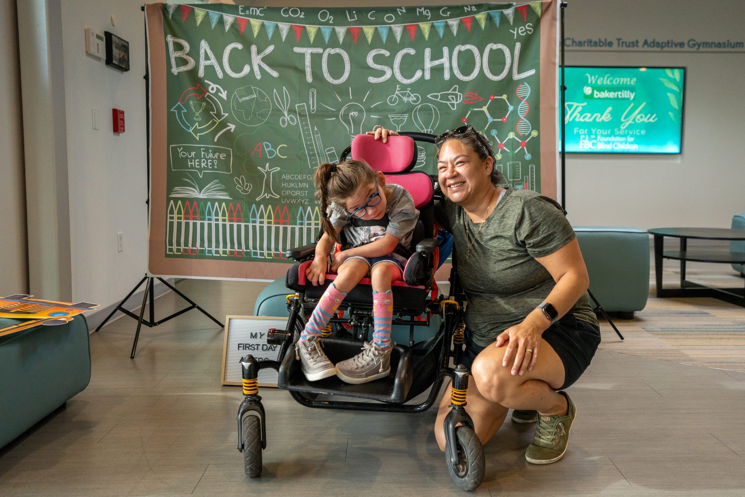 Mother and daughter smile for the camera at FBCs first day of school