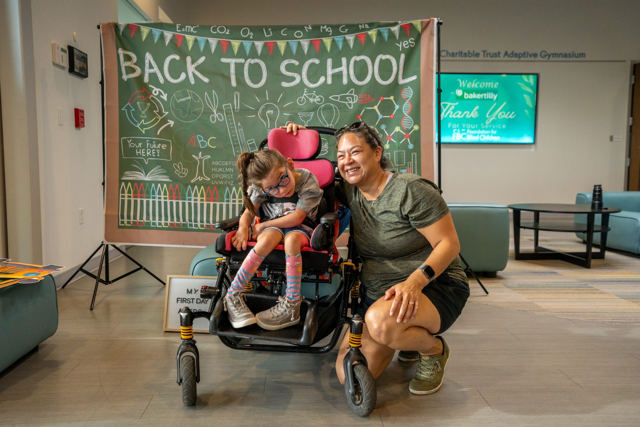 Mother and daughter smile for the camera at FBCs first day of school