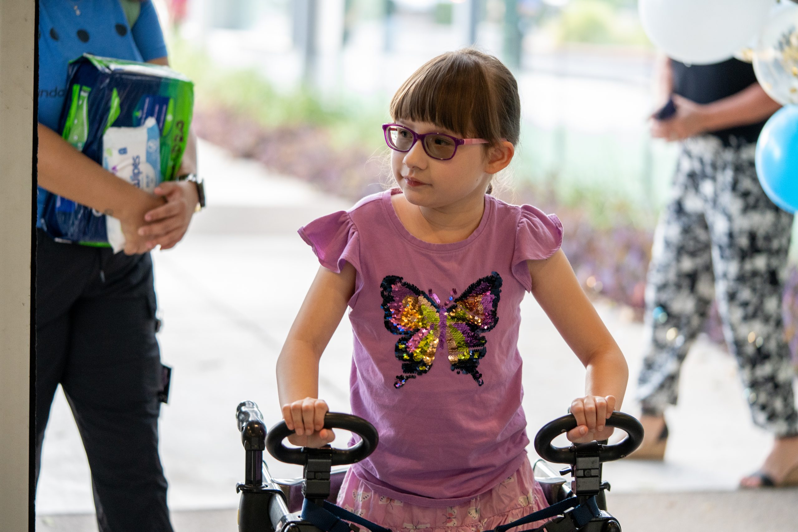 A young girl walks inside the main FBC building for the first day of school.