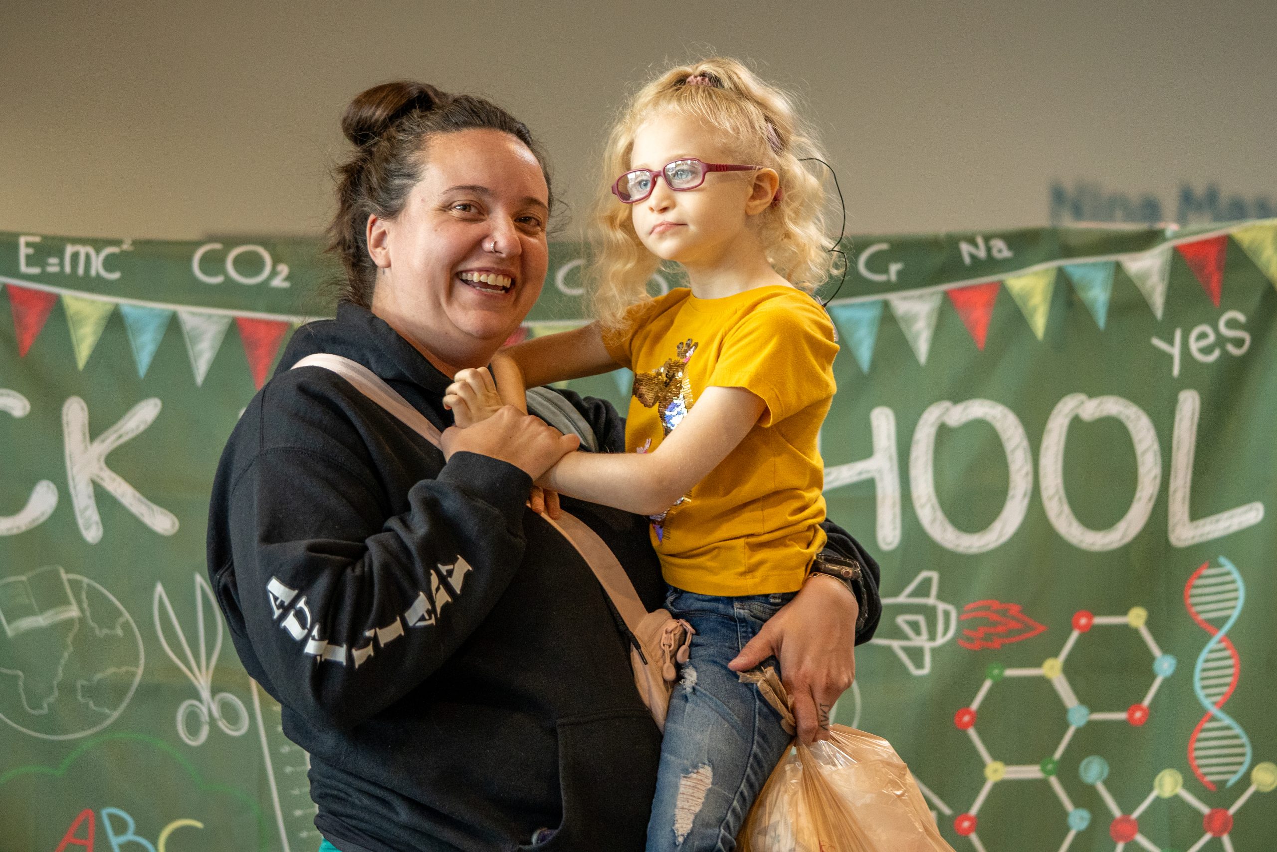 A mother holds her daughter at FBC's main campus.