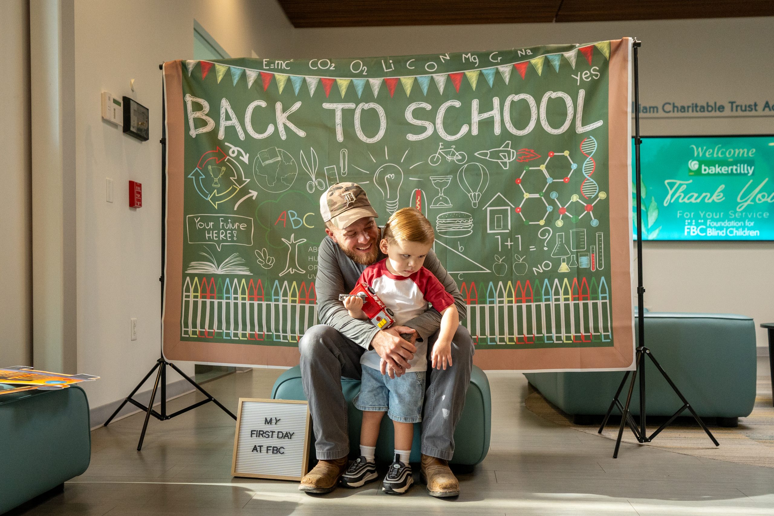 Father and son pose for a photo at FBCs main campus