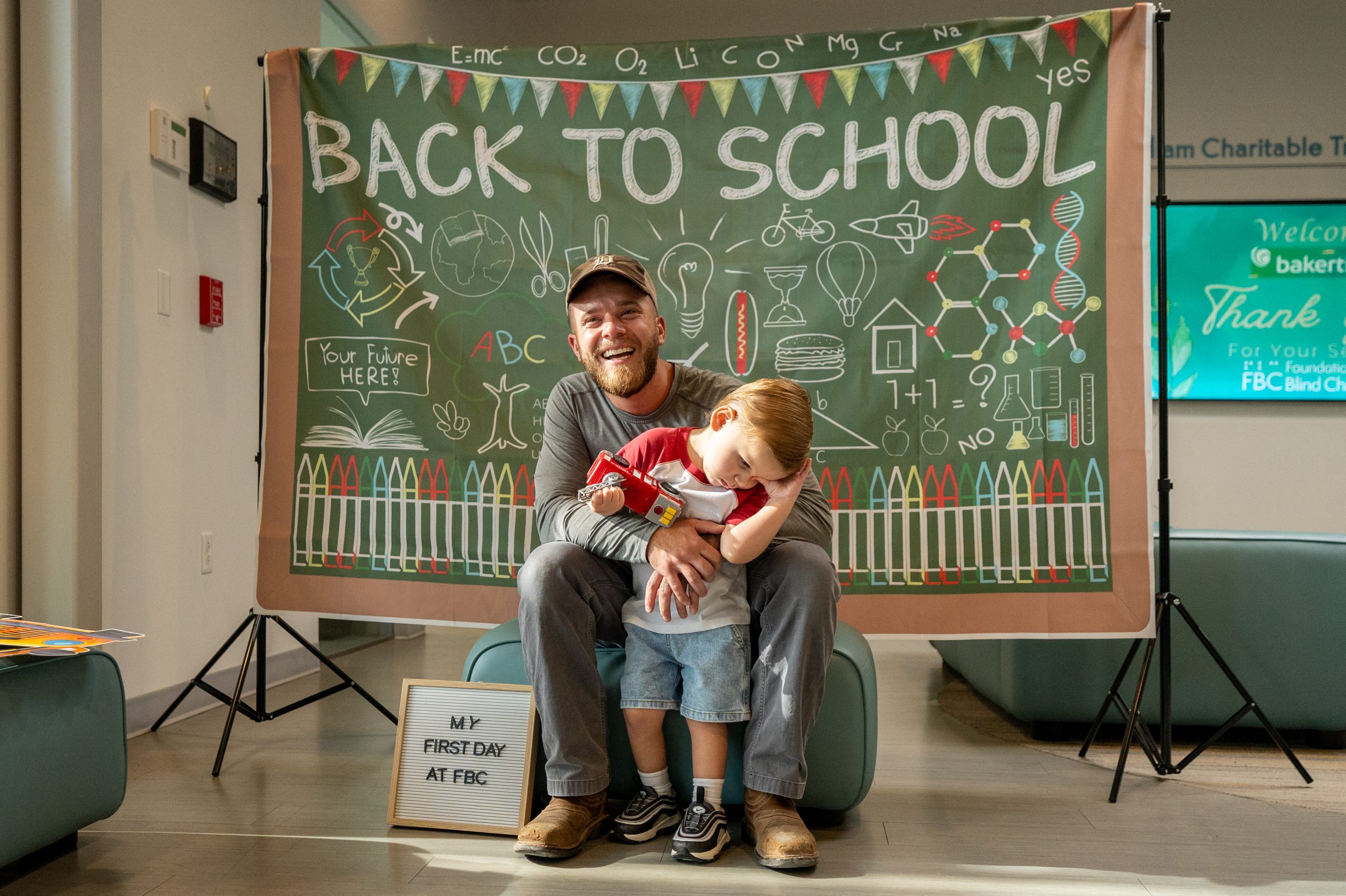Father and son pose for a photo at FBCs main campus
